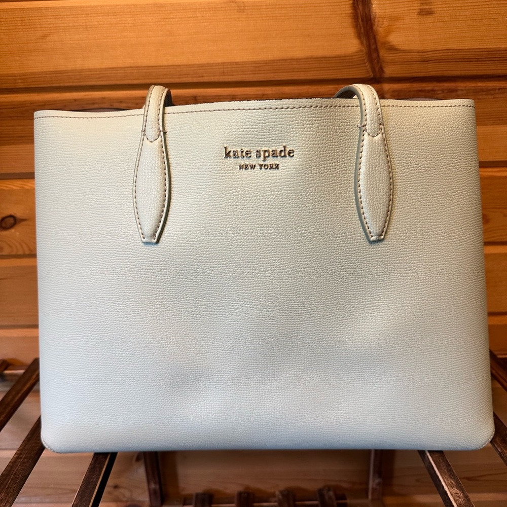 Kate Spade oversized tote bag with bonus contrasting clutch